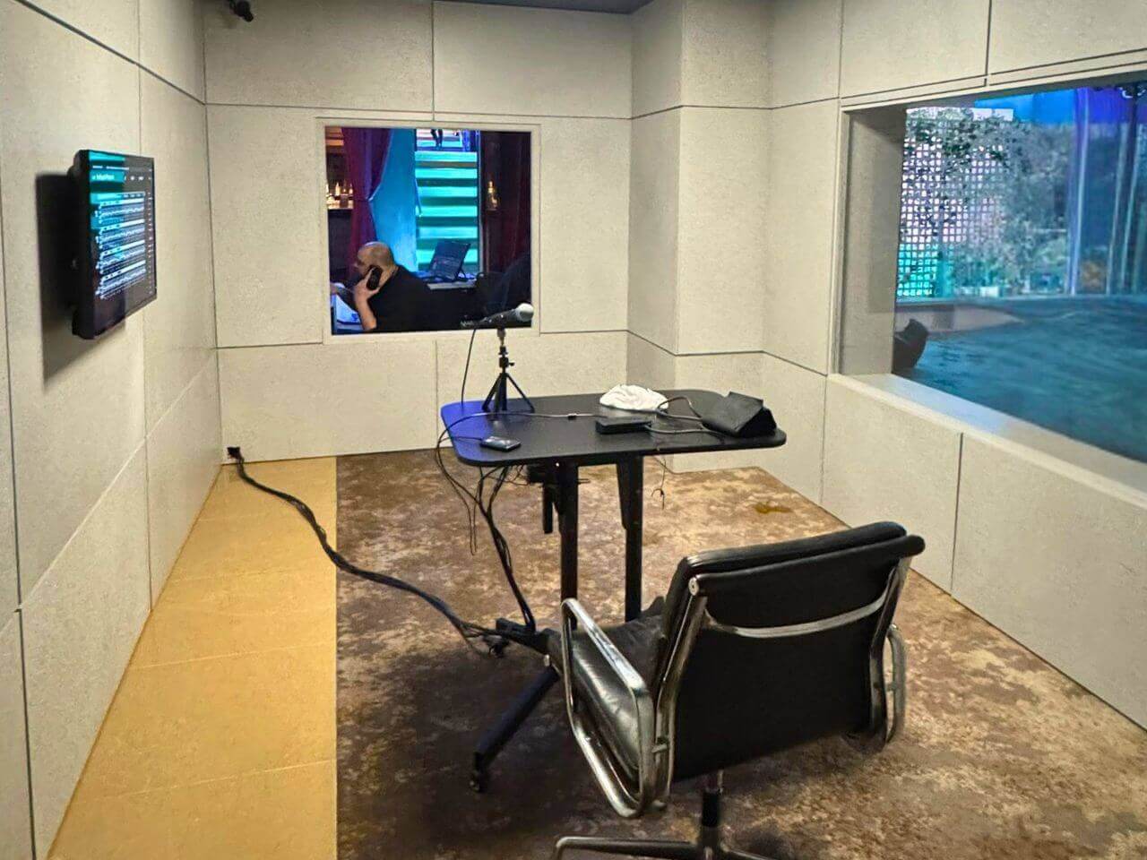 Paradise Launch Event – Interrogation Room Set Build Interrogation room set built for the Paradise launch event, featuring acoustic wall panels, table setup and viewing windows for immersive experience.